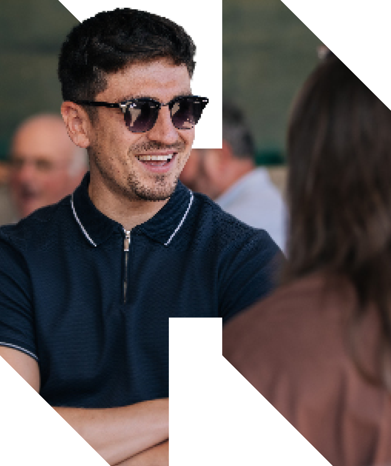 A Hillsgreen team member chatting at a rural event