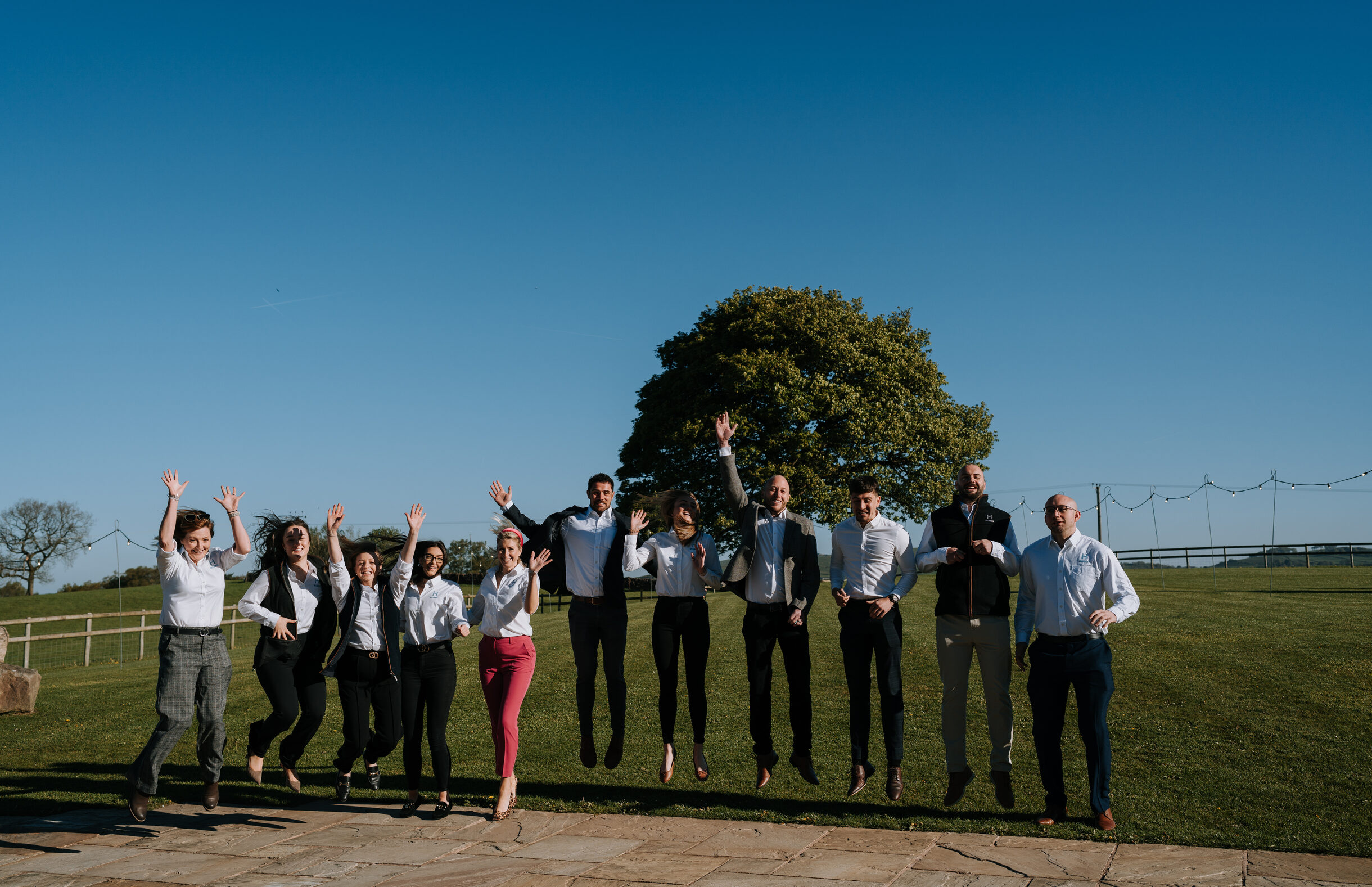 The Hillsgreen team celebrating outdoors
