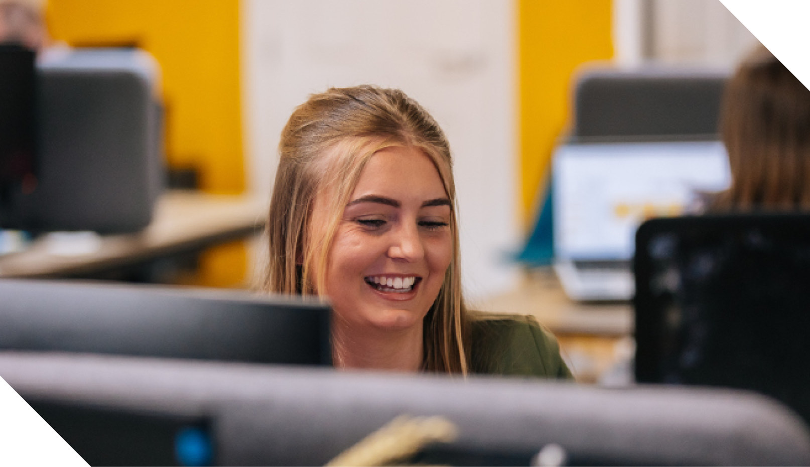 A colleague at her desk